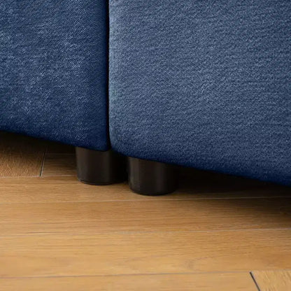 Canapé modulable avec rangement, dossier cylindrique et accoudoirs, assise profonde et confortable, durable et offrant un bon soutien pour le salon.