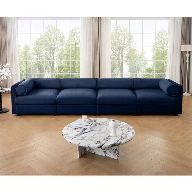 Canapé modulable avec rangement, dossier cylindrique et accoudoirs, assise profonde et confortable, durable et offrant un bon soutien pour le salon.