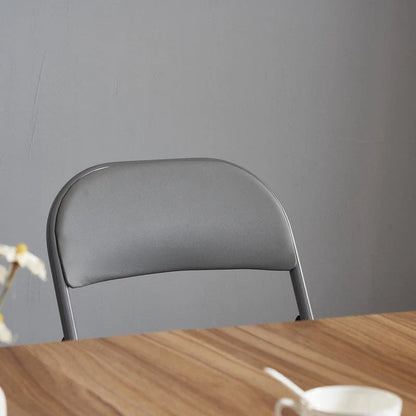 Chaises pliantes élégantes en fer et PVC pour conventions et expositions Blanches