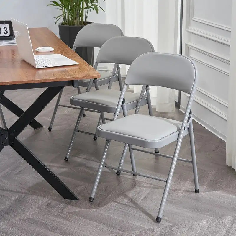 Chaises pliantes élégantes en fer et PVC pour conventions et expositions Blanches