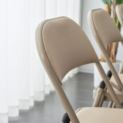 Chaises pliantes élégantes en fer et PVC pour conventions et expositions Blanches