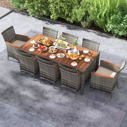 Costway 9 Pieces Outdoor Wicker Dining Set with Acacia Wood Table and 8 Armchairs