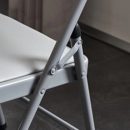 Chaises pliantes élégantes en fer et PVC pour conventions et expositions Blanches